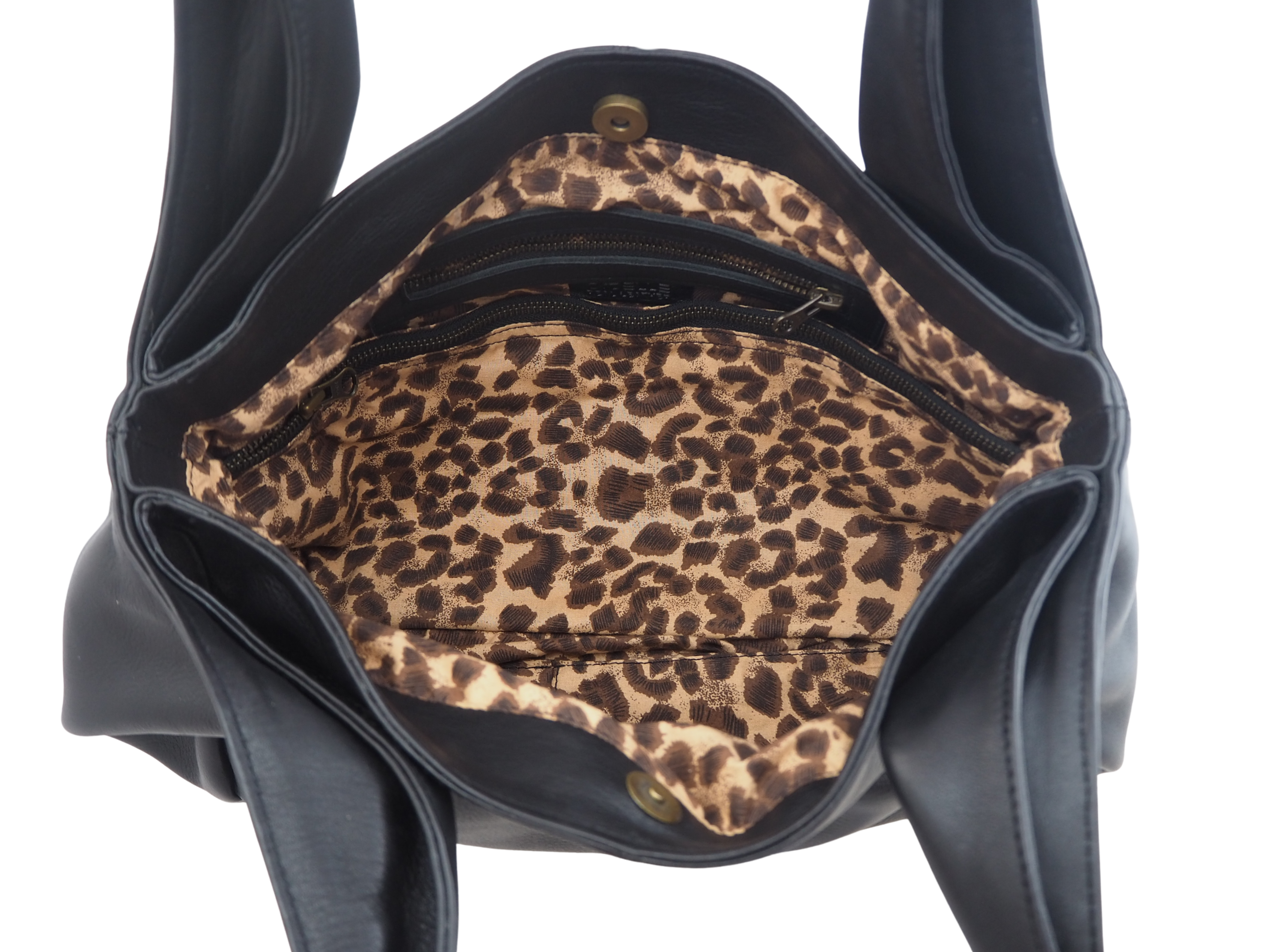 Cadelle Peta black leather handbag with structured tote silhouette inside view