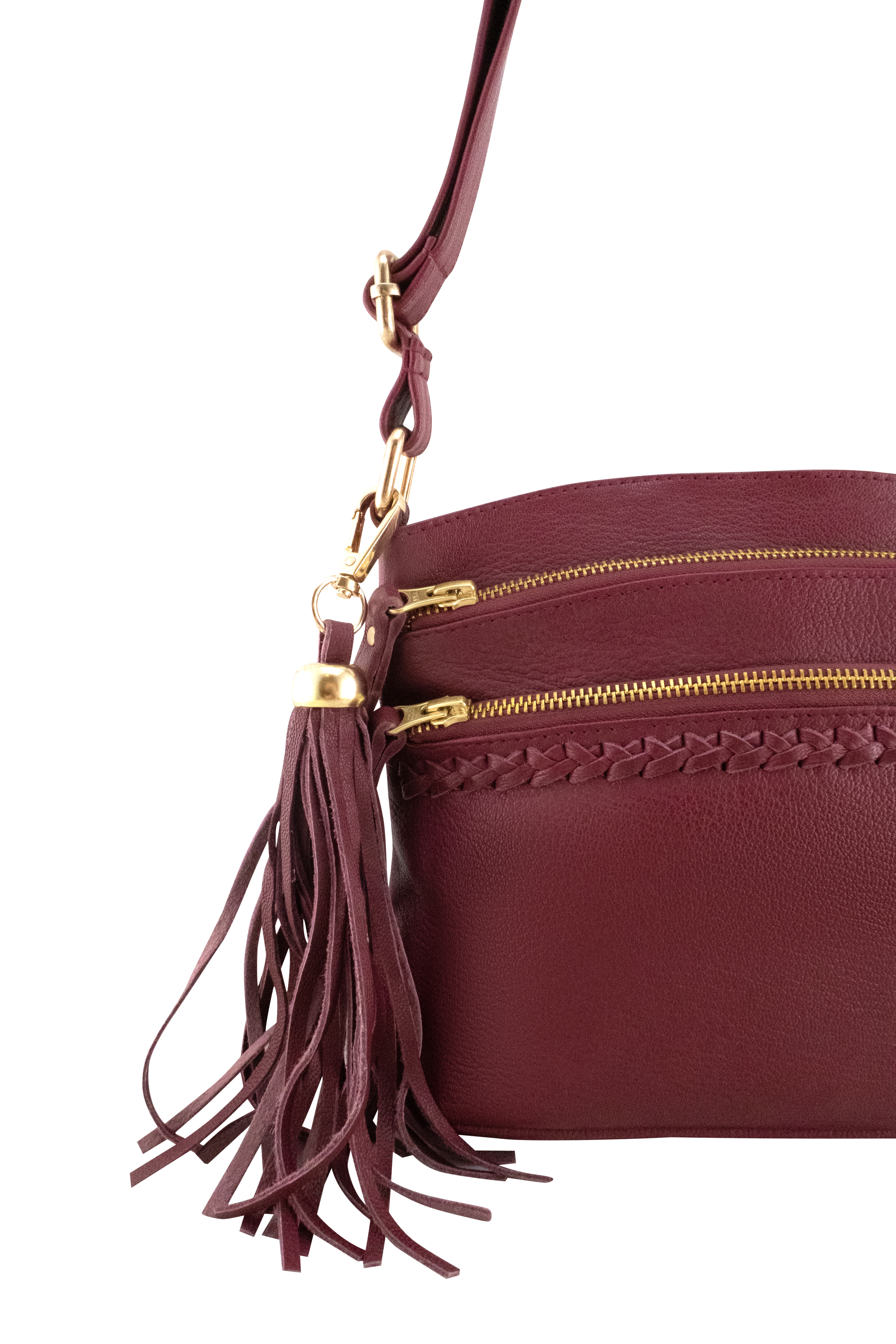 Cadelle Bridgette berry leather crossbody bag with multiple zip pockets close up view