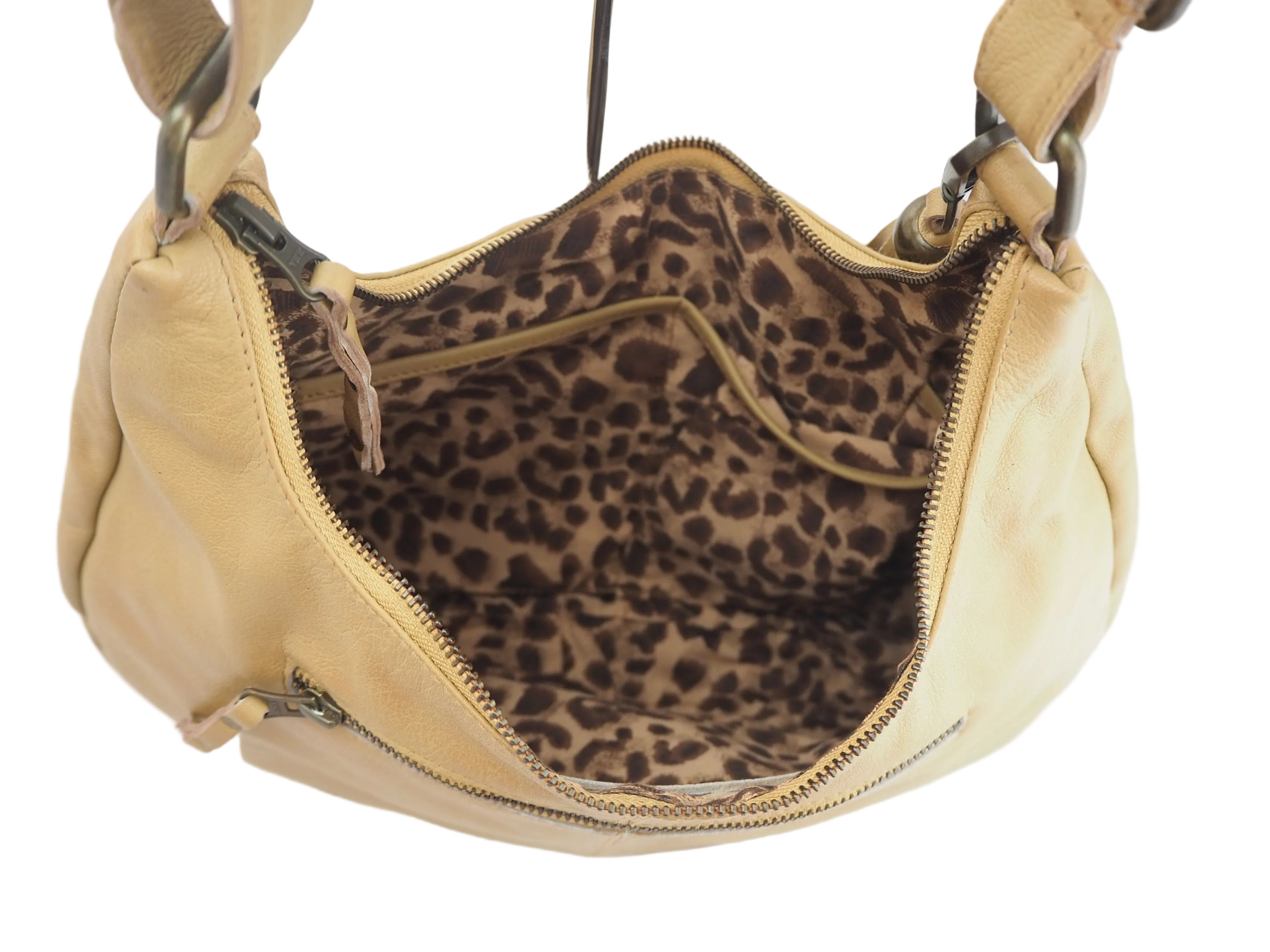 Camel leather handbag internal view with leopard print lining