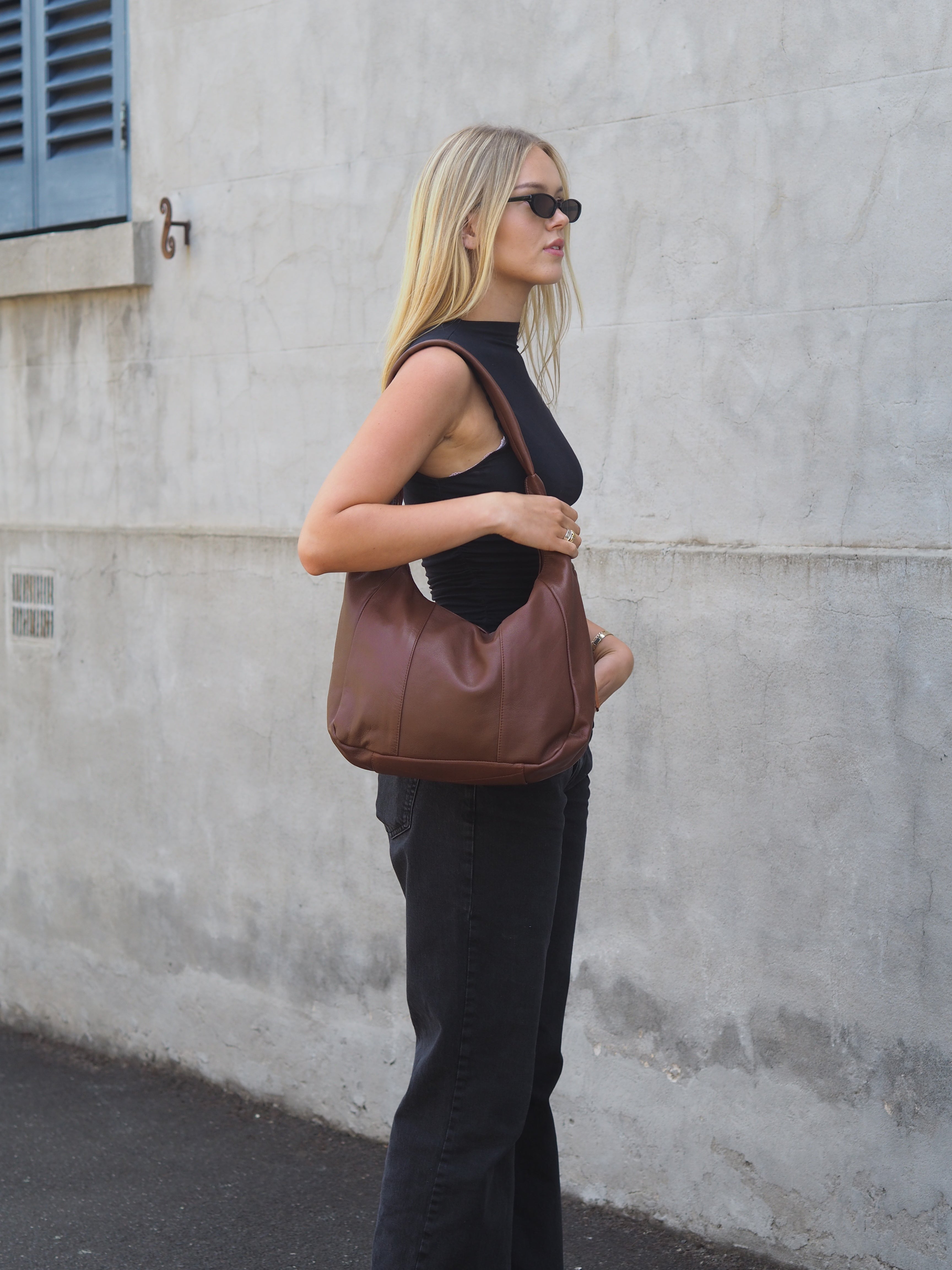 Cadelle Suki chocolate leather hobo bag with slouchy silhouette and tassel detail