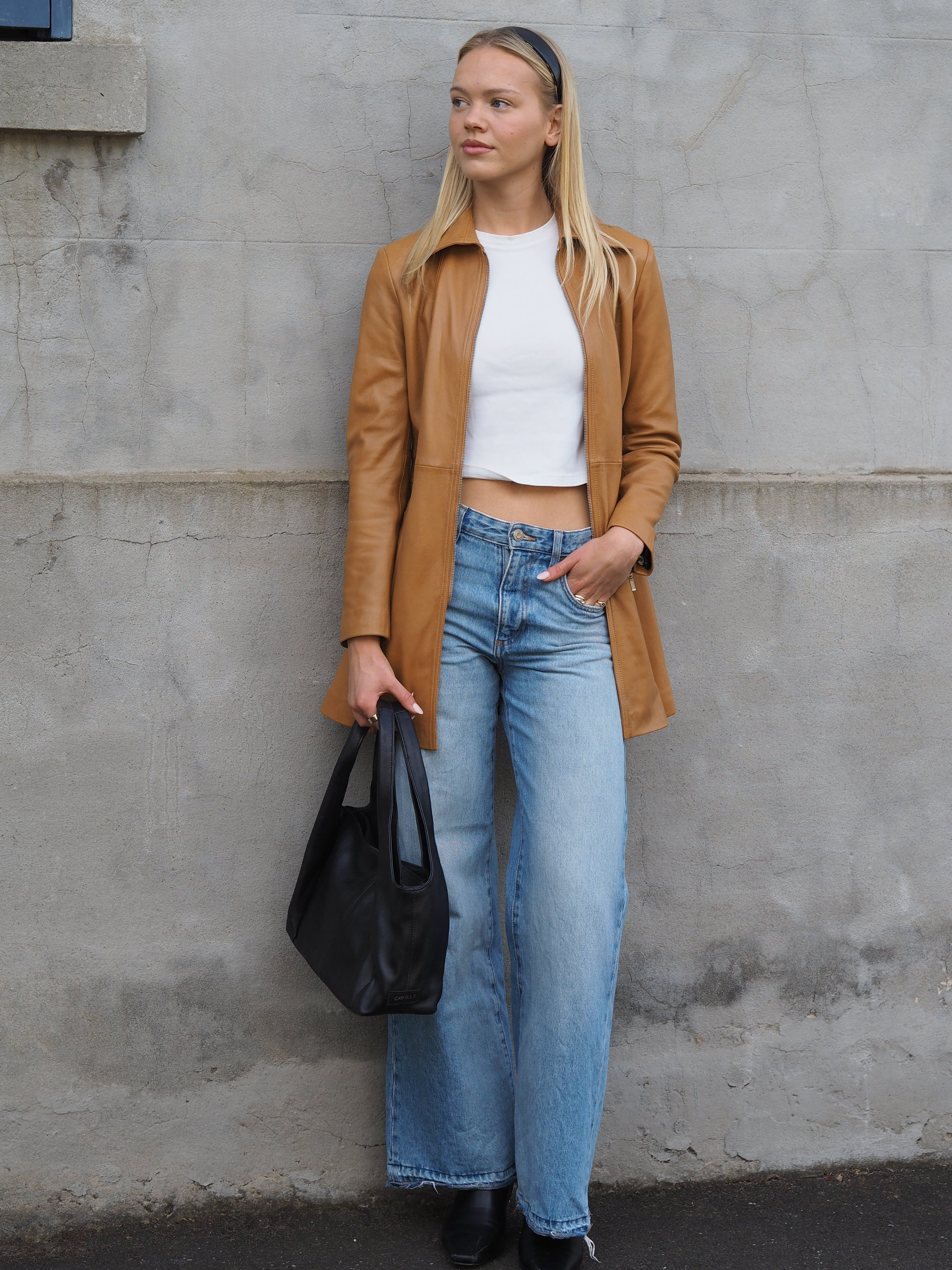 Camel leather mid length jacket with black leather bag