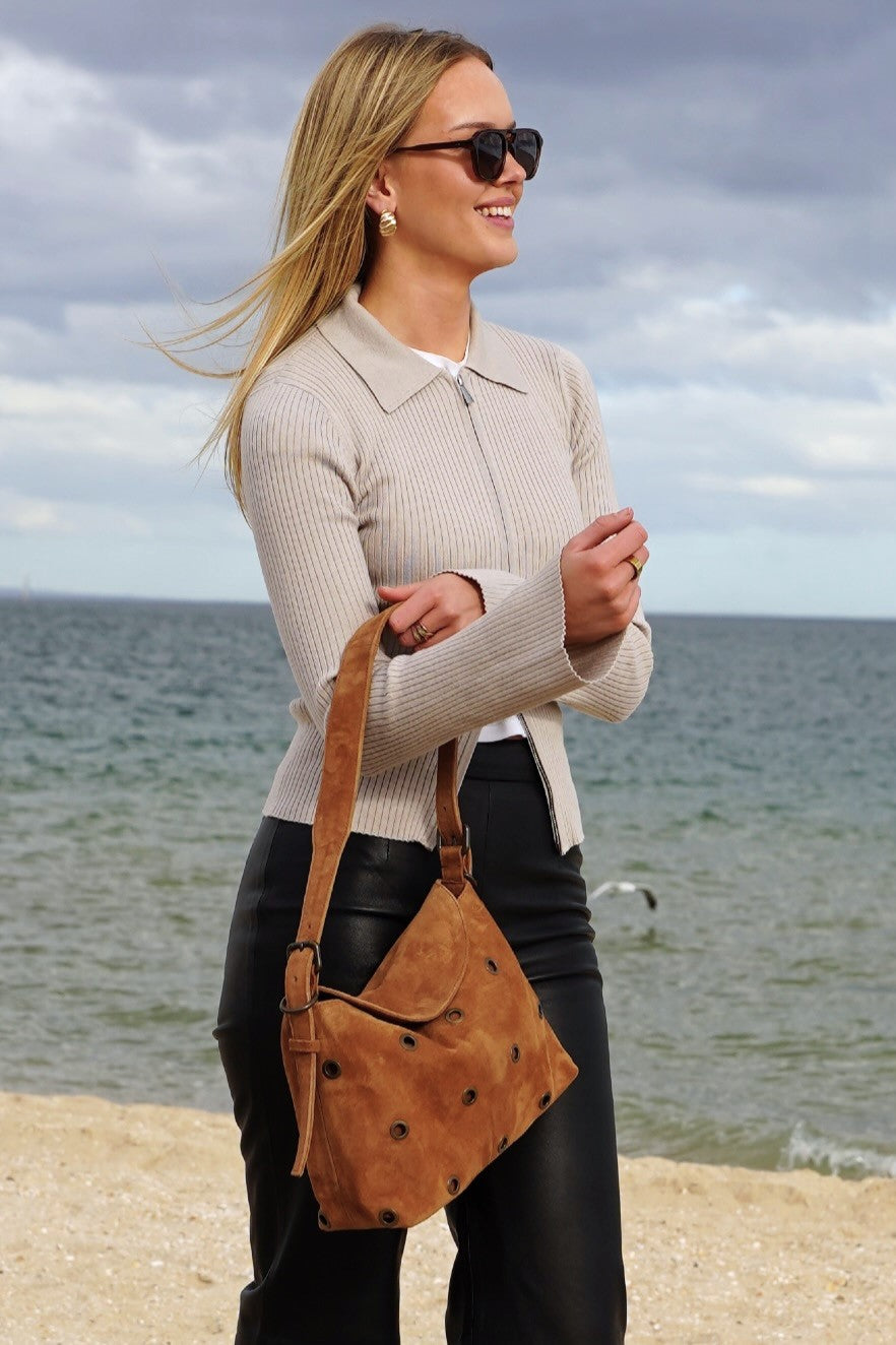 Cadelle Stevie tan suede shoulder bag with eyelet detailing and soft shape
