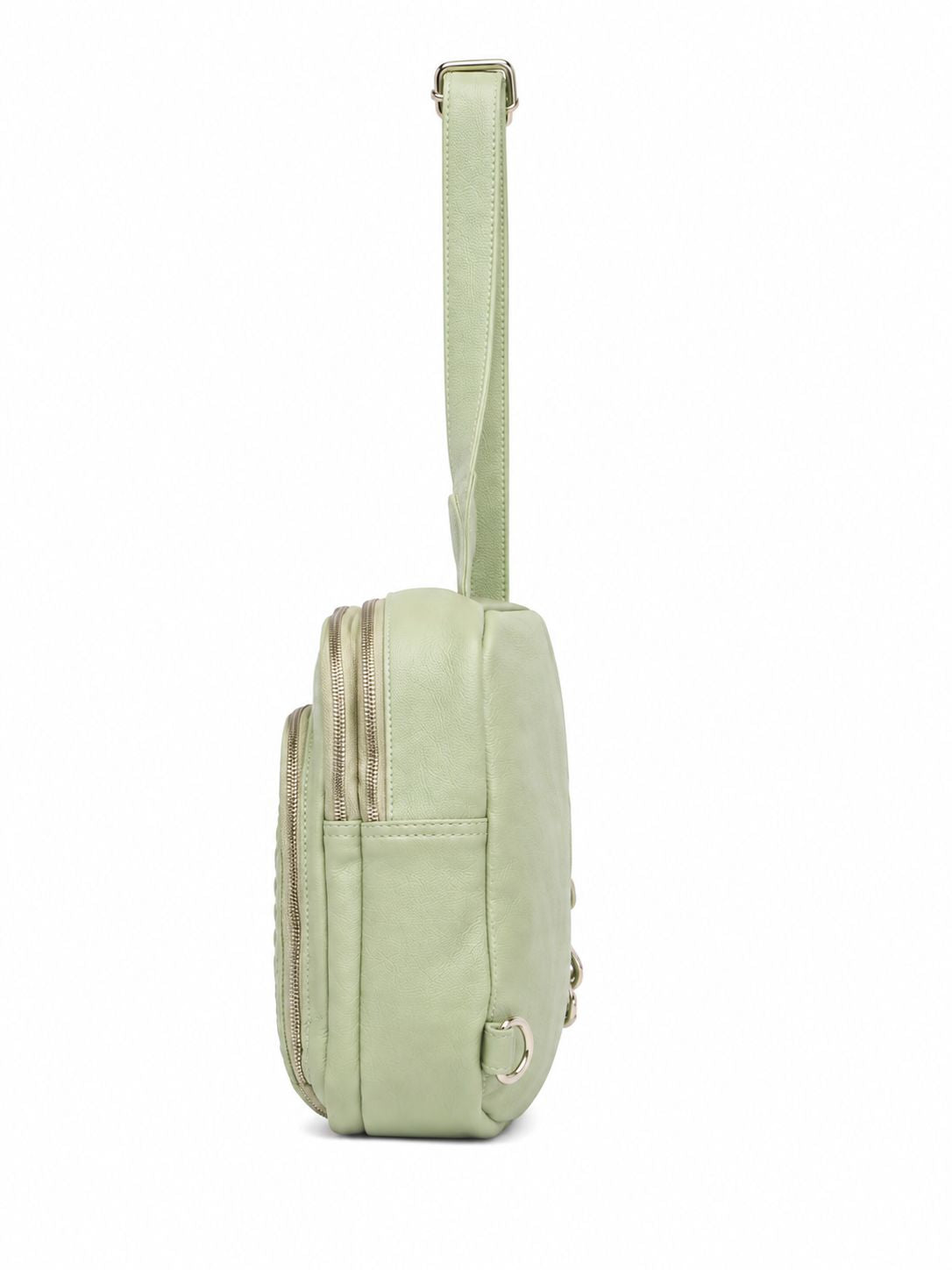 Cadelle Karissa mint green leather sling bag with a matching adjustable shoulder strap, shown from a side profile view