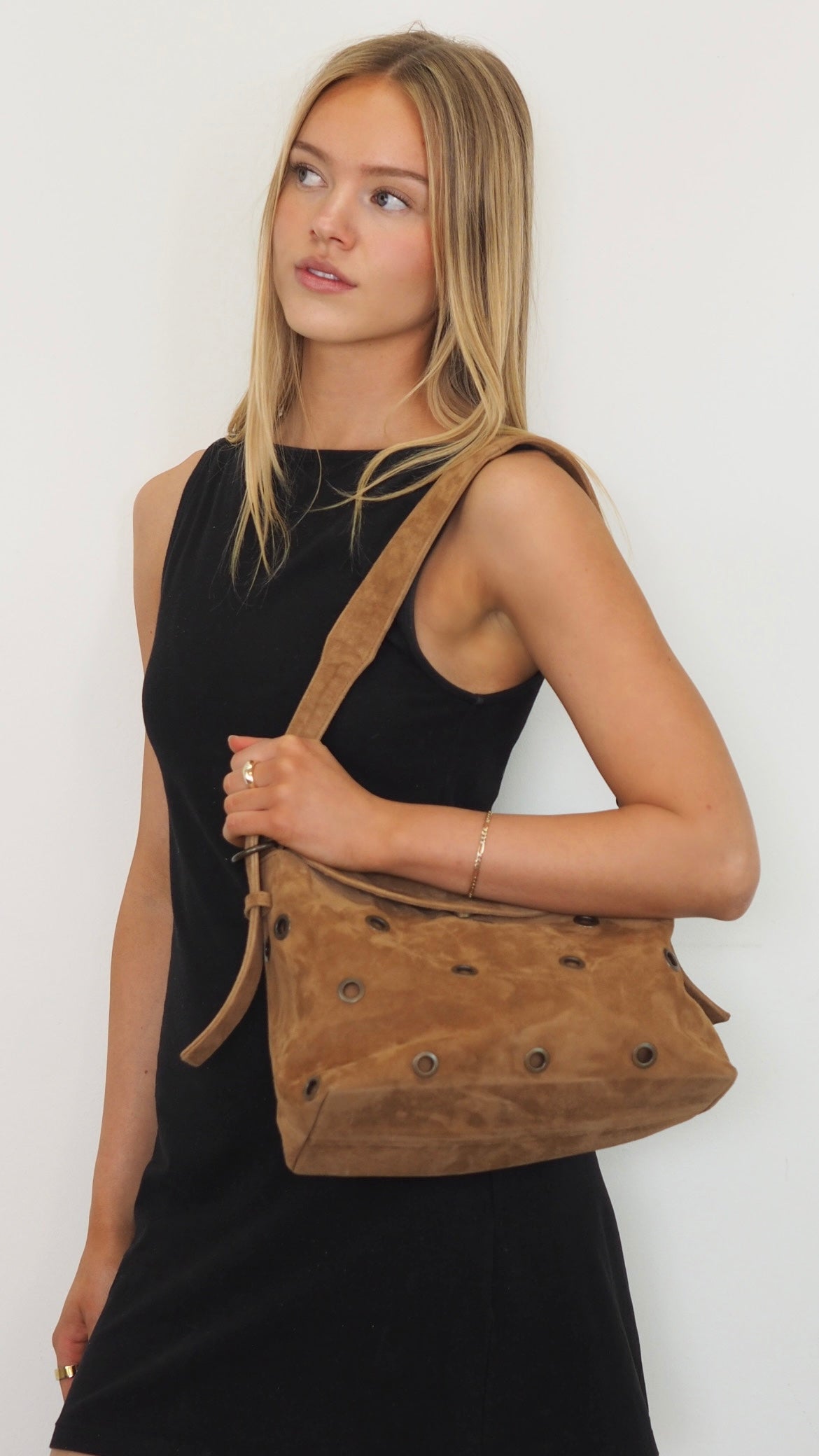 Cadelle Stevie tan suede shoulder bag with eyelet detailing and soft shape