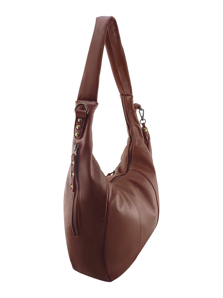 Cadelle Suki chocolate leather hobo bag with slouchy silhouette and tassel detail side view