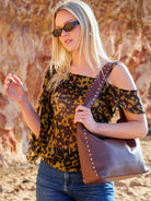 Cadelle Blondie chocolate leather shoulder bag with silver studs 