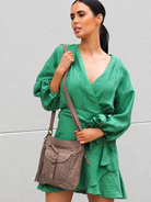 Cadelle Leather Millie crossbody with front woven pocket and adjustable crossbody strap