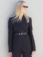 Cadelle Ita black leather belt with sleek buckle and minimal design