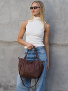 Chocolate leather  handbag and crossbody with studs and stitching