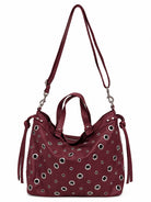 Cadelle Annelise berry leather shoulder bag with eyelet detail