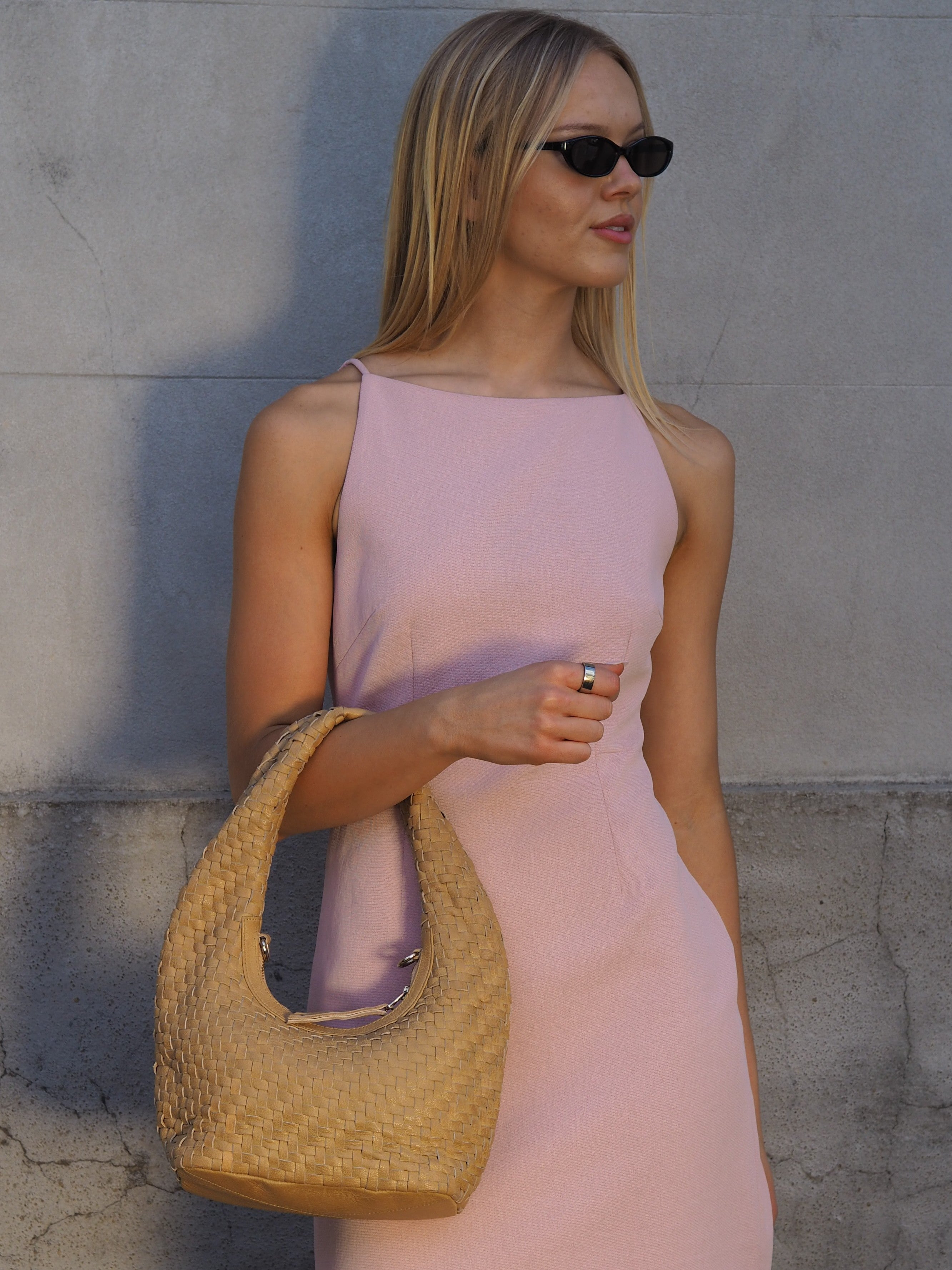 Cadelle Izzy camel leather crescent handbag with woven detail front view