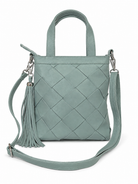 Carter pale blue leather woven leather handbag with top handles, a detachable shoulder strap, and a tassel accent