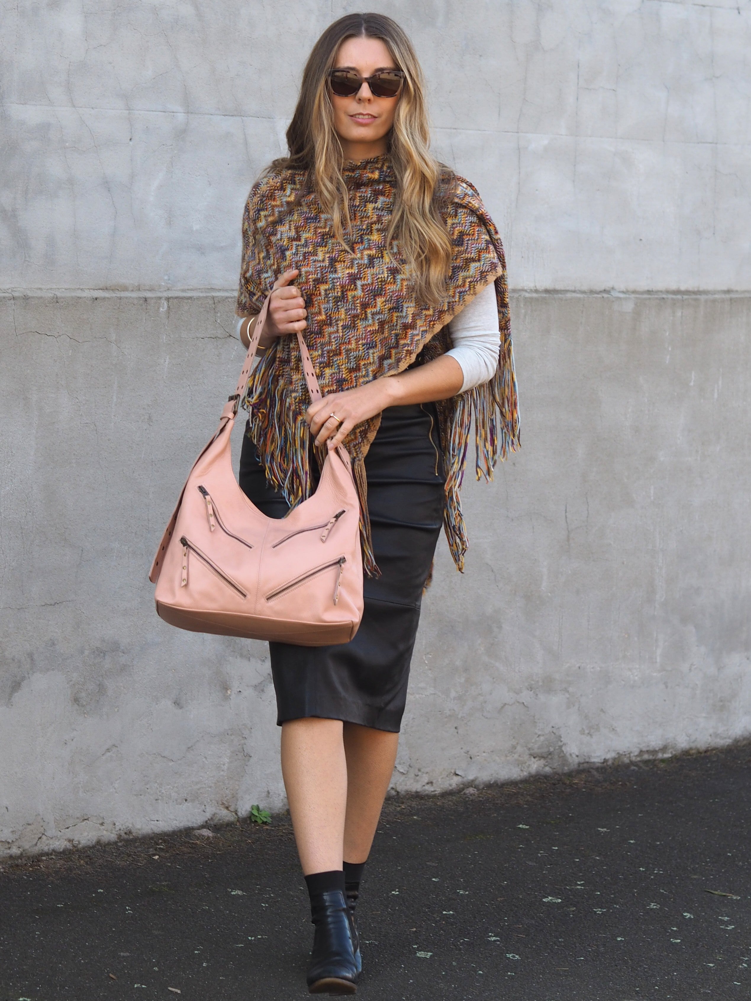 Misty Rose  leather bag with four zip front pockets