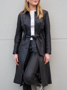 Cadelle Claire black leather trench coat with button front front view