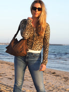 Cadelle Stevie chocolate suede  shoulder bag with eyelets and an adjustable strap