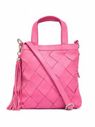 Cadelle Carter fuchsia pink woven leather handbag with top handles, a detachable shoulder strap, and a tassel 