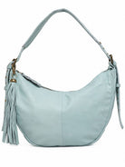 Cadelle Helena pale blue leather hobo bag with a crescent shape, featuring a matching detachable leather tassel 