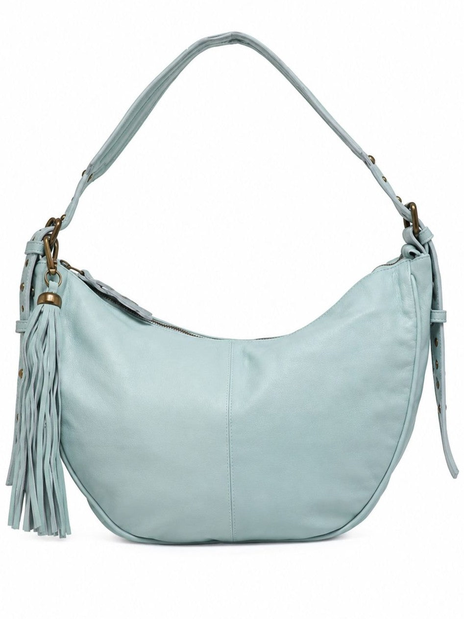Cadelle Helena pale blue leather hobo bag with a crescent shape, featuring a matching detachable leather tassel 
