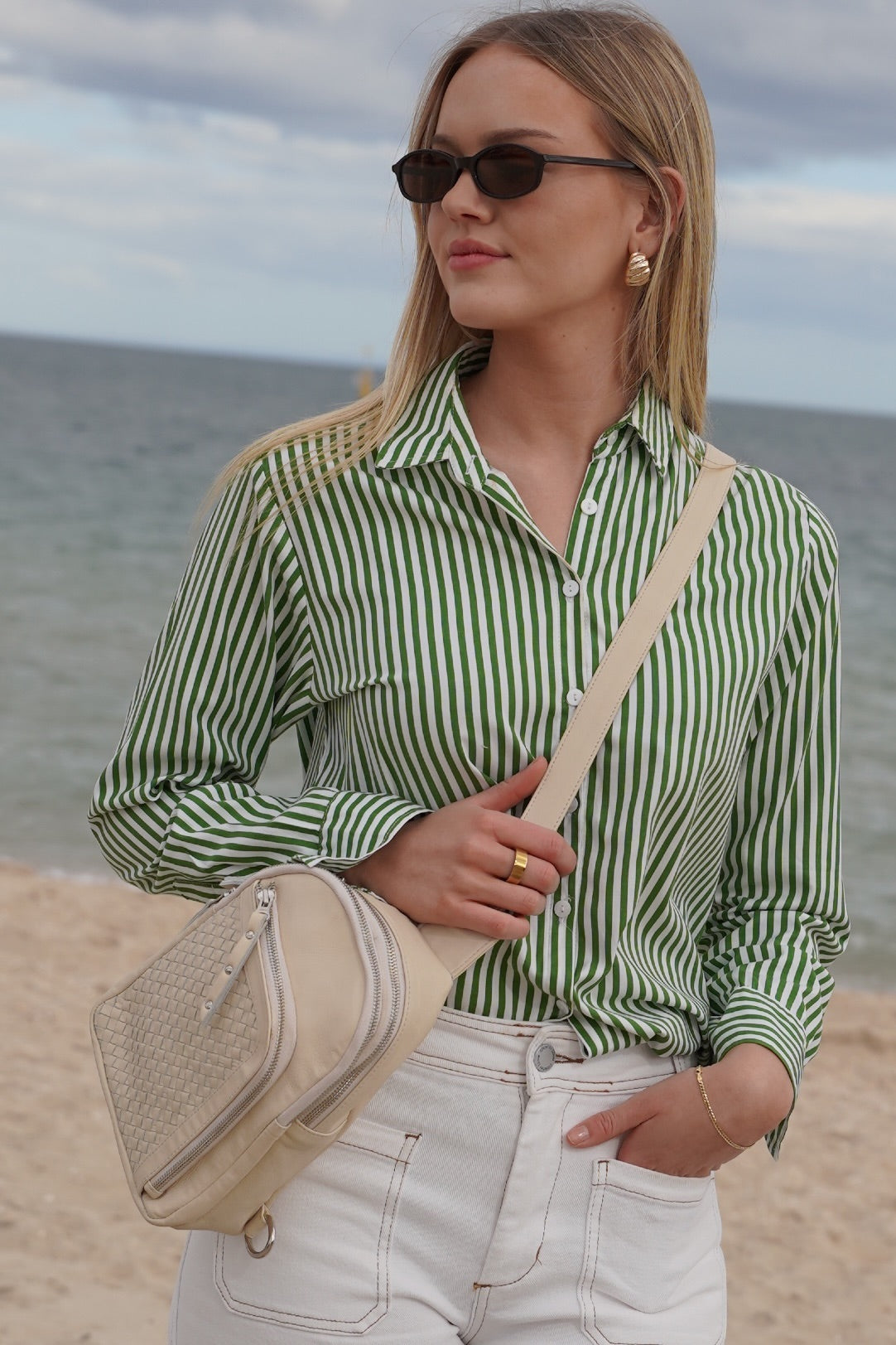 Cadelle Karissa cream leaether sling bag with woven front pocket