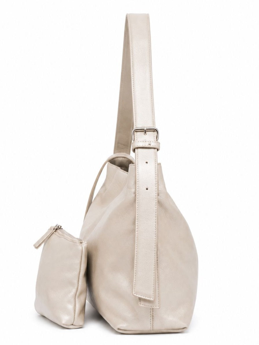 Cadelle Piper champagne metallic leather shoulder bag- side view