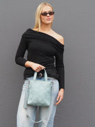 Carter pale blue leather crossbody with double handles and detachable crossbody strap