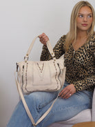 Mila cream leather tote with stud and stitch detaill on the front