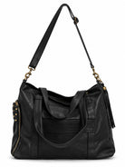 Cadelle Victoria black leather overnighter back view, with luggage sleeve 