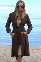 Cadelle Claire chocolate leather trench coat with button front front view