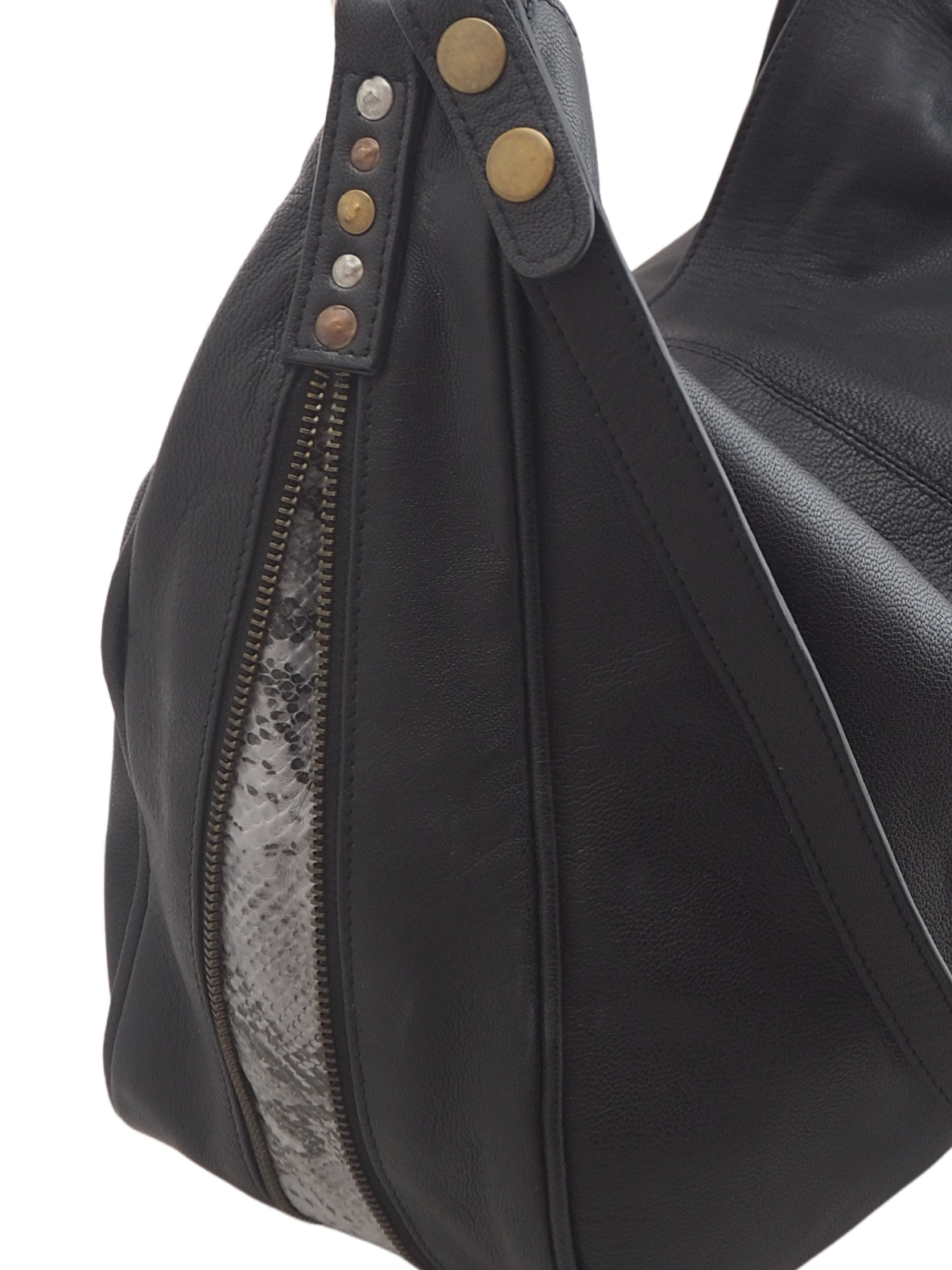 Close up of black leather handbag with snake print inserts